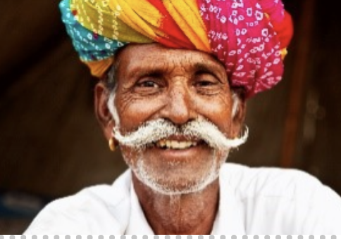 Man wearing colorful headwear